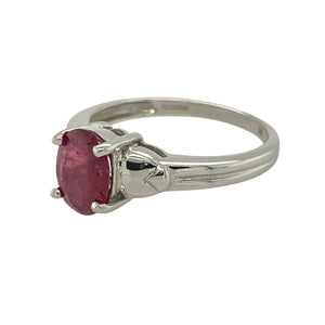 Rich in colour and refined in style, this pre-owned 9ct white gold ruby ring offers timeless elegance—perfect for adding a bold yet classic touch to any look.

Design: The ring features an 8mm by 6mm oval ruby stone at the centre, set in a traditional claw setting that highlights its deep red hue.
Material: Made from 9-carat white gold, the polished finish provides a cool, contemporary contrast to the warm richness of the ruby.
