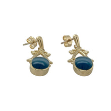 Load image into Gallery viewer, Elegant and softly vibrant, these pre-owned 9ct yellow gold drop earrings feature rich blue agate stones—perfect for adding colour and movement to your everyday or occasion wear.

Design: Each earring showcases an oval blue agate stone measuring 9mm by 7mm, set in a simple drop style that allows the stones to catch the light with subtle motion.
Material: Made from 9-carat yellow gold, the polished setting complements the cool tones of the agate with a warm, classic finish.


