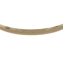 Load image into Gallery viewer, Elegant and enduring, this pre-owned 9ct yellow solid gold bangle features detailed patterning and classic proportions—perfect for everyday elegance or stacking with other favourites.

Design: The bangle showcases a 4mm wide band with a subtle engraved pattern, adding texture and shine to its sleek circular shape.
Material: Made from solid 9-carat yellow gold, the polished and patterned finish offers both durability and refined style.

