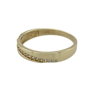 Elegant with a hint of sparkle, this pre-owned 9ct yellow gold band ring features a sleek design with a modern twist—perfect for everyday wear or a touch of understated glamour.

Design: The ring showcases a 3.5mm wide band with cubic zirconia stones set diagonally across the front, creating a graceful line of shimmer.
Material: Made from 9-carat yellow gold, the polished finish enhances the brilliance of the stones and adds warmth to the sleek band.
