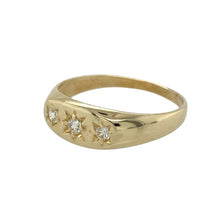 Load image into Gallery viewer, Charming and versatile, this pre-owned 9ct yellow gold signet ring features subtle sparkle and classic styling—ideal as a men’s pinky ring or a special piece for a child.

Design: The ring showcases a 5mm high front set with three cubic zirconia stones in starburst settings, adding a touch of vintage-inspired brilliance.
Material: Made from 9-carat yellow gold, the polished finish enhances the warm tone and crisp detailing of the star-set stones.

