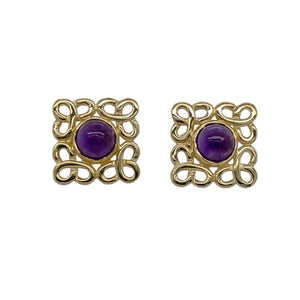 Rich in colour and heritage detail, these pre-owned 9ct yellow gold amethyst stud earrings feature striking stones and intricate Celtic design—perfect for adding bold elegance with symbolic charm.

Design: Each earring features a 6mm round amethyst stone set at the centre of a square-shaped stud with detailed Celtic knot patterning surrounding the gemstone.
Material: Made from 9-carat yellow gold, the polished finish highlights the intricate Celtic design and enhances the deep purple hue of the amethysts.

