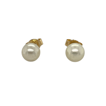 Timeless and elegant, these pre-owned 9ct yellow gold pearl stud earrings offer classic sophistication—perfect for everyday grace or special occasion style.

Design: Each earring features a 6mm round pearl set on a polished gold post, creating a simple yet refined silhouette.
Material: Made from 9-carat yellow gold, the smooth finish complements the soft lustre of the pearls for a warm, graceful look.
