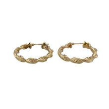 Load image into Gallery viewer, Elegant with a touch of texture, these pre-owned 9ct yellow gold twisted hoop creole earrings offer a stylish update to a classic design—perfect for everyday wear or adding subtle interest.

Design: Each earring features a traditional creole hoop with a gentle twist, creating movement and visual depth in a sleek, circular form.
Material: Made from 9-carat yellow gold, the polished finish enhances the twisted design with a warm, lustrous shine.

