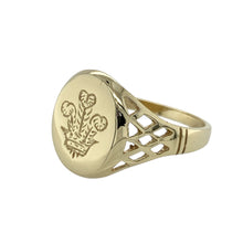 Load image into Gallery viewer, Bring heritage detail and bold character to your jewellery collection with this pre-owned 9ct yellow gold oval signet ring, featuring the classic Three Feathers emblem—perfect for timeless style with personal meaning.

Design: The ring features an oval-shaped face measuring 14mm high, engraved with the traditional Three Feathers motif, offering a strong and symbolic centrepiece.
Material: Made from 9-carat yellow gold, the polished finish enhances the intricate detail and adds a warm, refined glow.

