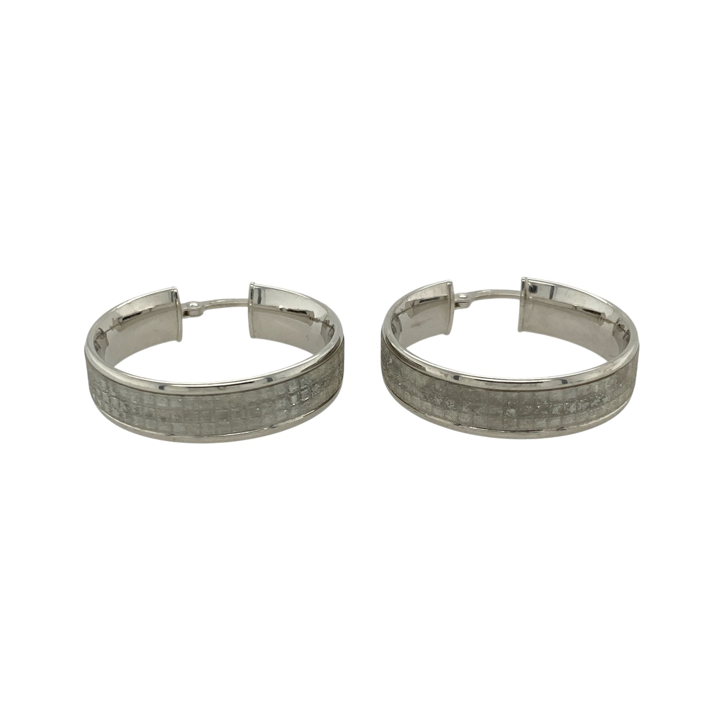 Bring shimmering elegance and versatile style to your jewellery collection with these pre-owned 9ct white gold sparkle hoop creole earrings—perfect for both everyday wear and special occasions.

Design: Each earring features a classic creole hoop shape with a sparkle-cut finish, catching the light beautifully for added brilliance.
Material: Made from 9-carat white gold, the polished surface and bright tone give a sleek, modern look with timeless appeal.
