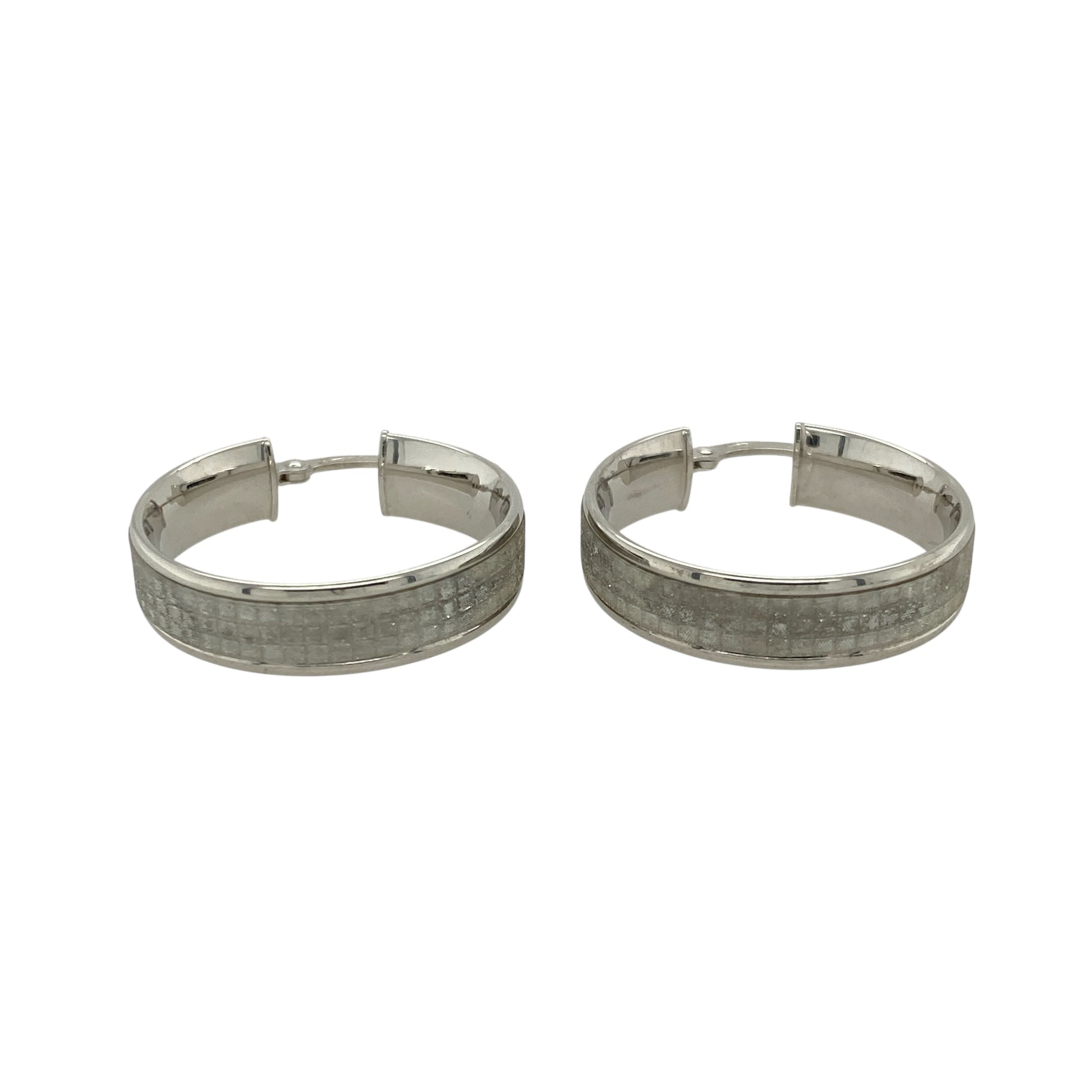 Bring shimmering elegance and versatile style to your jewellery collection with these pre-owned 9ct white gold sparkle hoop creole earrings—perfect for both everyday wear and special occasions.

Design: Each earring features a classic creole hoop shape with a sparkle-cut finish, catching the light beautifully for added brilliance.
Material: Made from 9-carat white gold, the polished surface and bright tone give a sleek, modern look with timeless appeal.
