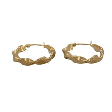 Load image into Gallery viewer, Bring soft texture and graceful design to your jewellery collection with these pre-owned 9ct yellow gold brushed effect ribbon hoop creole earrings—perfect for adding a touch of elegance to everyday style.

Design: Each earring features a flowing ribbon-inspired hoop creole shape with a brushed effect finish, creating gentle texture and light reflection.
Material: Made from 9-carat yellow gold, the warm tone and contrasting textures add depth and sophistication to the design.

