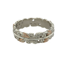 Load image into Gallery viewer, Bring elegant symbolism and timeless style to your jewellery collection with this pre-owned 925 silver Clogau Tree of Life band ring, detailed with 9ct rose gold—perfect for meaningful everyday wear.

Design: The 5mm wide band features the iconic Tree of Life motif, with flowing vines in polished 9ct rose gold woven into the design for a graceful and symbolic finish.

