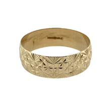 Load image into Gallery viewer, Bring classic style and subtle texture to your jewellery collection with this pre-owned 9ct yellow gold patterned band ring—perfect for timeless everyday wear.

Design: The ring features a 7mm wide band with fine patterned detailing, adding depth and visual interest to the simple silhouette.
Material: Made from 9-carat yellow gold, the polished finish enhances the warm golden tone and highlights the textured design.

