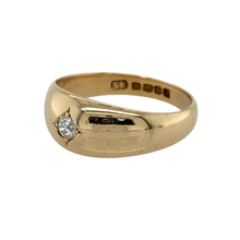 Load image into Gallery viewer, Bring timeless elegance and refined sparkle to your collection with this pre-owned 18ct yellow gold diamond solitaire band ring—perfect for special occasions or adding a touch of luxury to your everyday style.

Design: The ring features a bold 8mm wide band with a single diamond at the centre, offering a sleek and contemporary take on a classic solitaire look.
Material: Made from 18-carat yellow gold, the polished finish enhances the diamond’s natural brilliance and adds a warm, luxurious tone.

