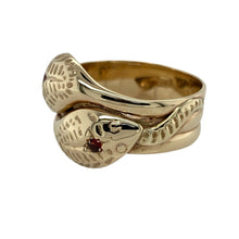 Load image into Gallery viewer, Bring symbolic design and vintage intrigue to your collection with this pre-owned 9ct yellow gold garnet double head snake ring—perfect for those who appreciate bold statement jewellery with meaning.

Design: The ring features a 15mm high front depicting two entwined snake heads, each adorned with a deep red garnet for striking contrast.
Material: Made from 9-carat yellow gold, the polished finish enhances the intricate detailing and the rich tones of the garnets.

