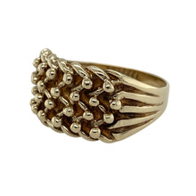 Load image into Gallery viewer, Bring bold design and classic character to your collection with this pre-owned 9ct yellow gold four row keeper ring—perfect for those who appreciate distinctive statement jewellery with a traditional twist.

Design: The ring features a 12mm high front with four raised rows in the iconic keeper style, creating a textured and substantial look.
Material: Made from 9-carat yellow gold, the polished finish enhances the warm tone and depth of the design.

