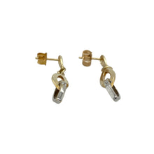 Load image into Gallery viewer, Bring contemporary elegance and a touch of sparkle to your collection with these pre-owned 9ct yellow and white gold two interlocking oval loop drop earrings—perfect for adding modern style to any look.

Design: Each earring features two interlocking oval loops, one in yellow gold and one in white gold, accented by a small cubic zirconia for subtle brilliance.
Material: Made from 9-carat yellow and white gold, the polished finish enhances the contrast between the metals and the sparkle of the stones.

