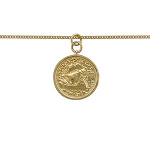 Bring historic charm and rich detail to your collection with this pre-owned 18ct yellow gold coin style pendant on an 18" curb chain—perfect for lovers of heritage-inspired jewellery.

Design: The necklace features a 2cm long coin-style pendant, including the bail, designed as a replica of the Sommer Islands (now Bermuda) coin, with a ship on one side and a boar on the other.
Material: Made from 18-carat yellow gold, the polished finish enhances the warm tone and crisp detailing of the pendant’s imagery.