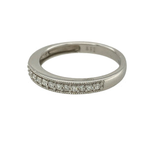 Bring delicate sparkle and refined detail to your collection with this pre-owned 9ct white gold diamond band ring—perfect for everyday elegance or pairing with other rings for a layered look.

Design: The ring features a 2mm wide front accented with diamonds and finished with a beaded edge for added texture and charm.
Material: Made from 9-carat white gold, the cool-toned polished finish enhances the brilliance of the diamonds.
