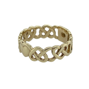 Bring timeless charm and symbolic detail to your collection with this pre-owned 9ct yellow gold Celtic heart patterned band ring—an elegant design with meaningful character.

Design: The ring features an openwork Celtic heart motif that flows around the band, combining intricate detail with a romantic touch.
Material: Made from 9-carat yellow gold, the polished finish highlights the open pattern and adds classic appeal.
