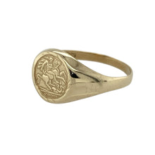 Load image into Gallery viewer, Bring symbolic detail and golden charm to your collection with this pre-owned 9ct yellow gold George and the Dragon coin-style children’s ring—a meaningful piece in a petite design.

Design: The ring features a coin-style front depicting the classic George and the Dragon motif, measuring 9mm high for a bold look in a smaller size.
Material: Made from 9-carat yellow gold, the polished finish enhances the detailed imagery and adds timeless appeal.

