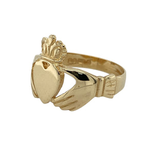 Bring tradition and timeless meaning to your collection with this pre-owned 9ct yellow gold Claddagh ring—a classic symbol of love, loyalty, and friendship.

Design: The ring features the traditional Claddagh motif with two hands holding a crowned heart, measuring 14mm high at the front for a bold and detailed look.
Material: Made from 9-carat yellow gold, the polished finish enhances the symbolic design and adds classic appeal.
