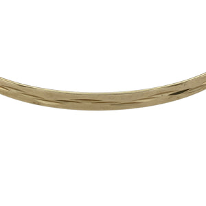 Bring refined sparkle and golden elegance to your collection with this pre-owned 9ct yellow solid gold diamond cut patterned bangle—a timeless accessory for both everyday wear and special occasions.

Design: The bangle features a diamond cut patterned finish, creating light-catching detail that adds shimmer and sophistication.
Material: Made from solid 9-carat yellow gold, the polished surface enhances the diamond cut texture and ensures lasting appeal.

