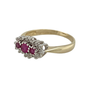 Bring rich colour and classic sparkle to your collection with this pre-owned 9ct yellow gold diamond and ruby cluster ring—a timeless design with elegant character.

Design: The ring features three vibrant ruby stones at the centre, framed by a cluster of diamonds for added brilliance. The front of the ring measures 7mm wide, giving it a refined presence.
Material: Made from 9-carat yellow gold, the polished finish enhances the warmth of the gold and complements the deep red rubies.
