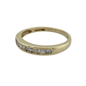 Bring timeless sparkle and golden elegance to your collection with this pre-owned 9ct yellow gold diamond band ring—a refined design perfect for everyday wear or special occasions.

Design: The ring features a 3mm wide band set with 0.25ct of diamond content across the front, offering brilliance and subtle sophistication.
Material: Made from 9-carat yellow gold, the polished finish enhances the classic style and complements the sparkle of the diamonds.
