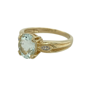 Bring vibrant colour and golden elegance to your collection with this pre-owned 9ct yellow gold blue stone ring—a classic design with a touch of sparkle.

Design: The ring showcases a 9mm by 7mm oval blue stone at the centre, accented by a small cubic zirconia on each shoulder for added brilliance.
Material: Made from 9-carat yellow gold, the polished finish complements the deep blue of the centre stone and the sparkle of the cubic zirconia accents.
