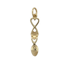 Load image into Gallery viewer, Bring heritage charm and golden elegance to your collection with this pre-owned 9ct yellow gold heart lovespoon pendant—a meaningful design rich in tradition and sentiment.

Design: The pendant features a classic Welsh lovespoon motif with a heart detail, symbolising love and affection.
Material: Made from 9-carat yellow gold, the polished finish enhances the intricate design and adds timeless appeal.

