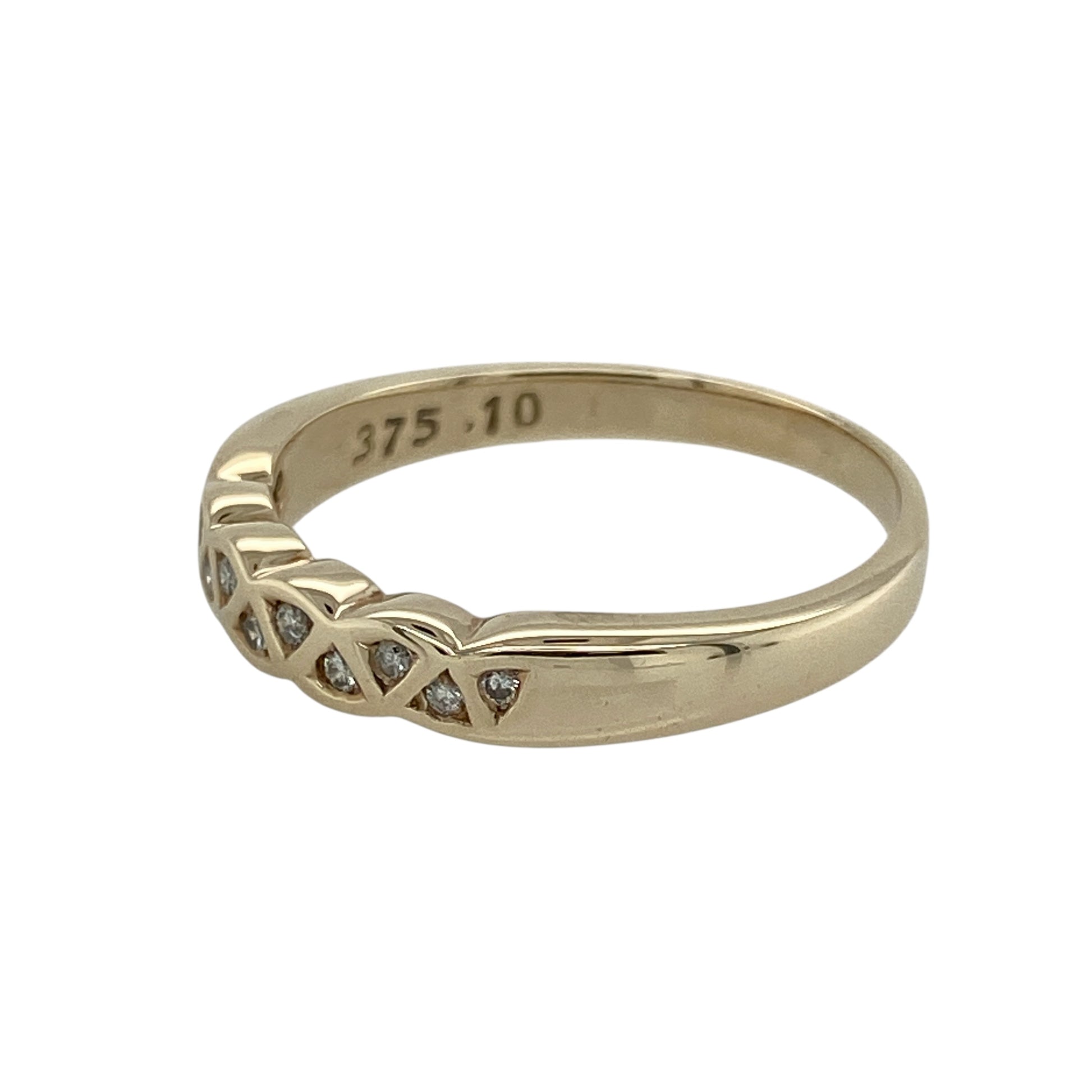 Bring timeless sparkle and golden elegance to your collection with this pre-owned 9ct yellow gold diamond band ring—a refined piece perfect for everyday wear or special occasions.

Design: The ring features a 3mm wide band accented with diamonds across the front, offering brilliance and subtle sophistication.
Material: Made from 9-carat yellow gold, the polished finish enhances the classic style and complements the sparkle of the diamonds.
