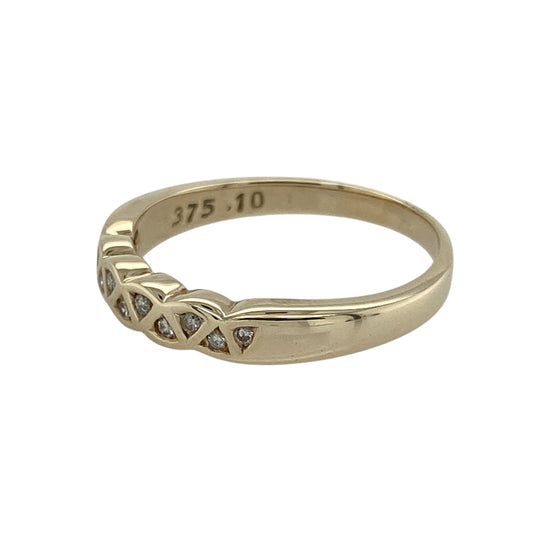 Bring timeless sparkle and golden elegance to your collection with this pre-owned 9ct yellow gold diamond band ring—a refined piece perfect for everyday wear or special occasions.

Design: The ring features a 3mm wide band accented with diamonds across the front, offering brilliance and subtle sophistication.
Material: Made from 9-carat yellow gold, the polished finish enhances the classic style and complements the sparkle of the diamonds.
