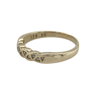 Bring timeless sparkle and golden elegance to your collection with this pre-owned 9ct yellow gold diamond band ring—a refined piece perfect for everyday wear or special occasions.

Design: The ring features a 3mm wide band accented with diamonds across the front, offering brilliance and subtle sophistication.
Material: Made from 9-carat yellow gold, the polished finish enhances the classic style and complements the sparkle of the diamonds.
