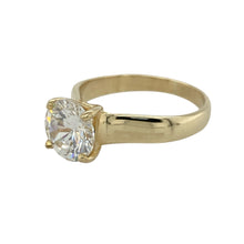 Load image into Gallery viewer, Add striking sparkle and timeless style to your collection with this pre-owned 9ct gold cubic zirconia solitaire ring, designed to catch the light with a bold and elegant presence—perfect for both everyday glamour and special occasions.

Design: Showcasing a single round cubic zirconia measuring 8mm in diameter, the solitaire design creates a classic and eye-catching look.

