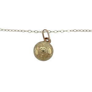 Bring playful charm and classic style to your collection with this pre-owned 9ct yellow gold football pendant necklace, a lightweight piece perfect for everyday wear or gifting.

Design: The necklace features a hollow football pendant measuring 18mm long including the bail, suspended from a 16" belcher chain for a simple yet eye-catching look.
Material: Made from 9-carat yellow gold, the polished finish gives both the pendant and chain a warm glow with timeless appeal.

