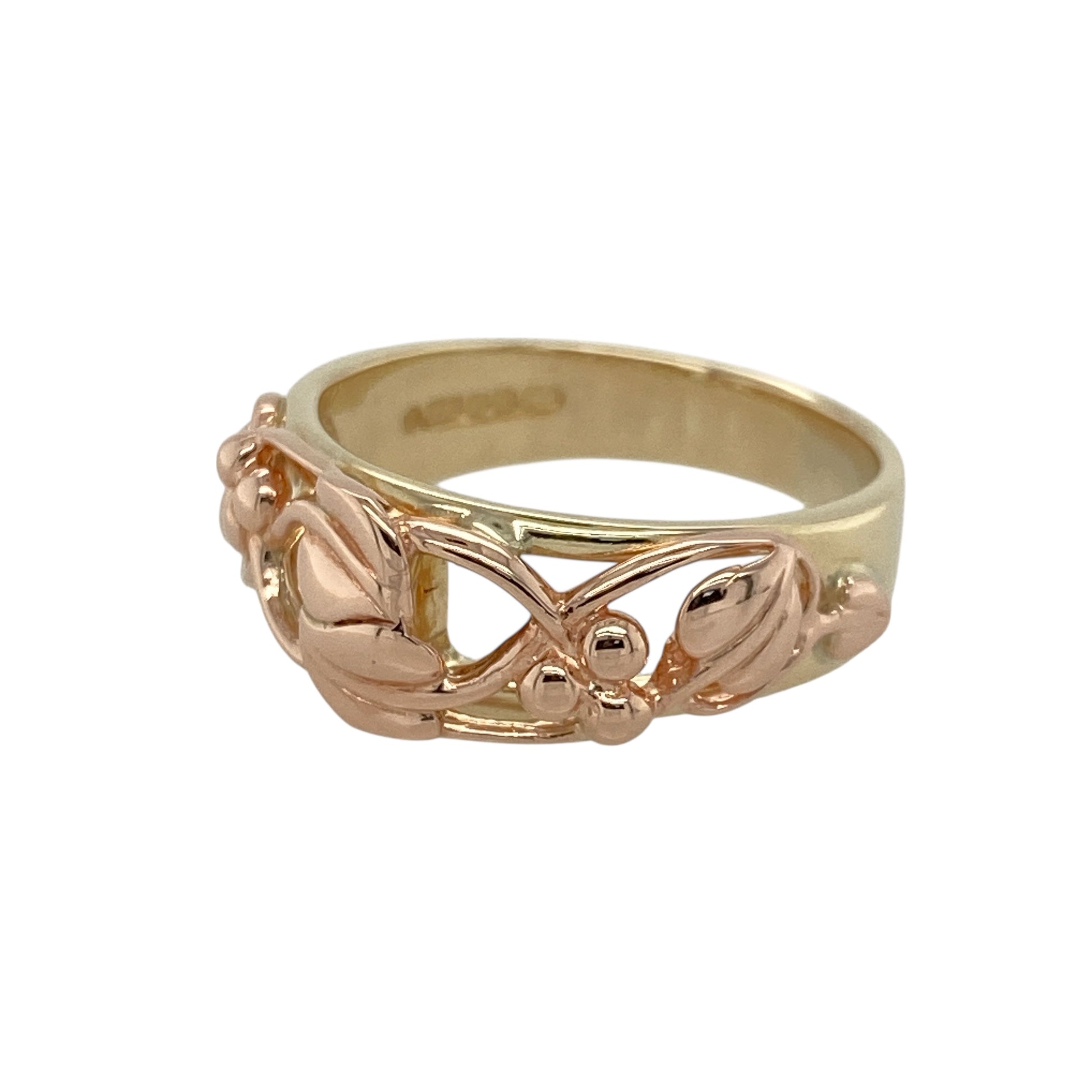 Bring symbolic beauty and heritage style to your collection with this pre-owned 9ct yellow and rose gold Tree of Life ring by Clogau, a meaningful design blending natural inspiration with timeless elegance.

Design: The front of the band measures 8mm wide and features the iconic Tree of Life motif, symbolising growth, strength, and harmony.
Material: Made from 9-carat yellow and rose gold, the two-tone finish enhances the intricate detailing and adds depth to the design.
