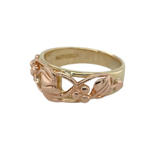 Load image into Gallery viewer, Bring symbolic beauty and heritage style to your collection with this pre-owned 9ct yellow and rose gold Tree of Life ring by Clogau, a meaningful design blending natural inspiration with timeless elegance.

Design: The front of the band measures 8mm wide and features the iconic Tree of Life motif, symbolising growth, strength, and harmony.
Material: Made from 9-carat yellow and rose gold, the two-tone finish enhances the intricate detailing and adds depth to the design.

