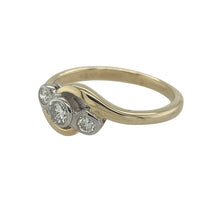 Load image into Gallery viewer, Bring symbolic meaning and refined sparkle to your collection with this pre-owned 9ct yellow gold diamond twist trilogy ring—a graceful design with timeless appeal.

Design: The ring features a classic three-stone arrangement with diamonds totalling approximately 0.17ct, held in a delicate twist setting for added elegance.
Material: Made from 9-carat yellow gold, the polished finish enhances the brilliance of the diamonds and the flowing twist design.

