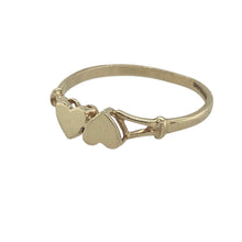 Load image into Gallery viewer, Bring romantic charm and golden simplicity to your collection with this pre-owned 9ct yellow gold double heart ring—a meaningful design with timeless appeal.

Design: The ring features two joined hearts across the 4mm wide front, symbolising love and unity in a delicate style.
Material: Made from 9-carat yellow gold, the polished finish enhances the smooth heart design and adds classic elegance.
Ring Detail: With its romantic motif, this piece makes a thoughtful keepsake or everyday accessory.

