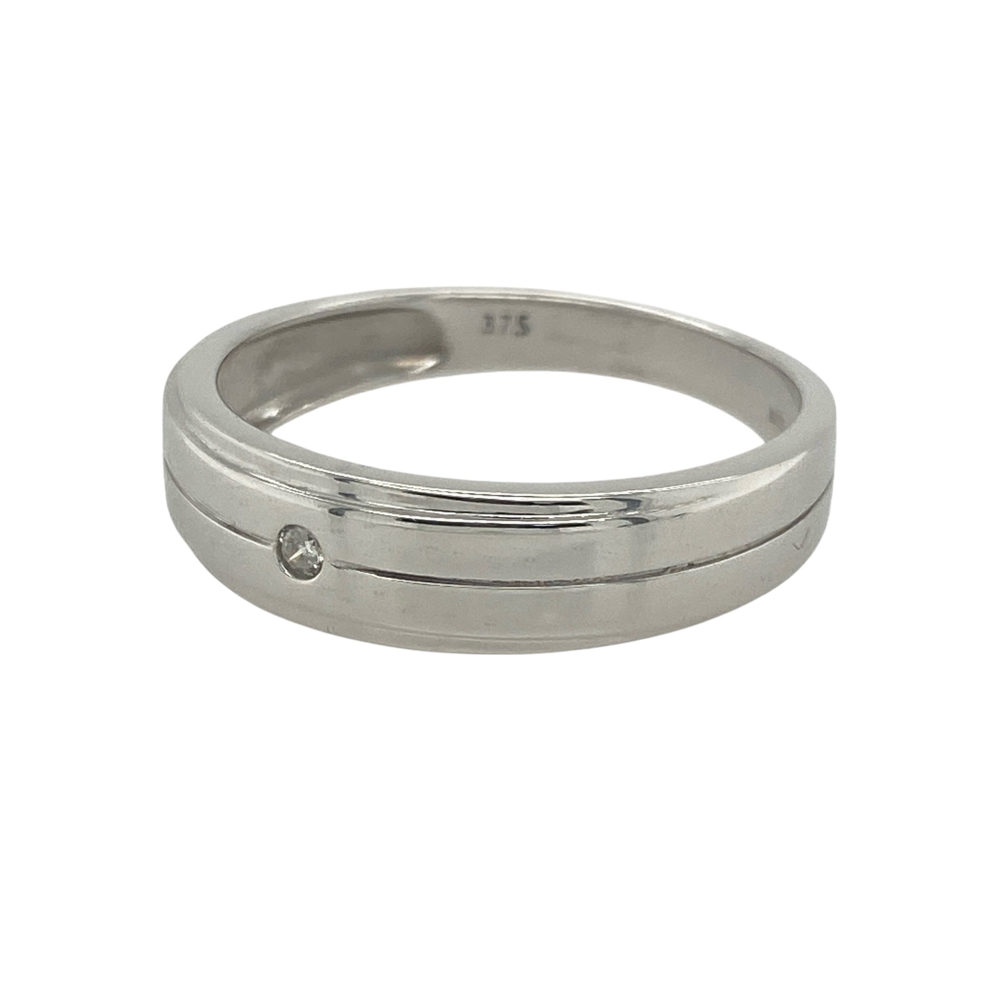 Bring refined sparkle and modern elegance to your collection with this pre-owned 9ct white gold diamond band ring—a timeless design with graceful presence.

Design: The ring features a 6mm wide band accented with diamonds across the front, offering brilliance and sophisticated style.
Material: Made from 9-carat white gold, the polished finish enhances the clean, contemporary look and the sparkle of the stones.
