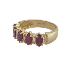 Load image into Gallery viewer, Bring rich colour and refined sparkle to your collection with this pre-owned 14ct yellow gold diamond and ruby band ring—a timeless design with elegant detail.

Design: The ring features marquise-cut rubies measuring 6mm by 3mm each, alternated with baguette-cut diamonds for a striking contrast of colour and brilliance.
Material: Made from 14-carat yellow gold, the polished finish enhances the warmth of the gold and the vivid tones of the rubies.

