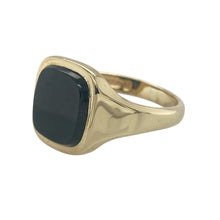 Load image into Gallery viewer, Bring bold elegance and sleek contrast to your collection with this pre-owned 9ct yellow gold onyx square signet ring, offering timeless appeal and a confident presence—ideal for both statement and everyday wear.

Design: The ring features a striking 10mm by 10mm square-cut onyx, adding depth and a refined touch of black contrast against the polished gold.
Material: Made from 9-carat yellow gold, the smooth finish enhances the deep lustre of the onyx while giving the piece a classic and versatile look.


