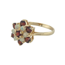 Load image into Gallery viewer, Bring rich colour and timeless charm to your collection with this pre-owned 9ct yellow gold garnet and opal cluster ring, combining fiery warmth with iridescent beauty—perfect for special occasions or elegant everyday wear.

Design: The ring features a center garnet with multiple opals surrounded by deep red garnets, forming a classic cluster design that measures 13mm high at the front.

