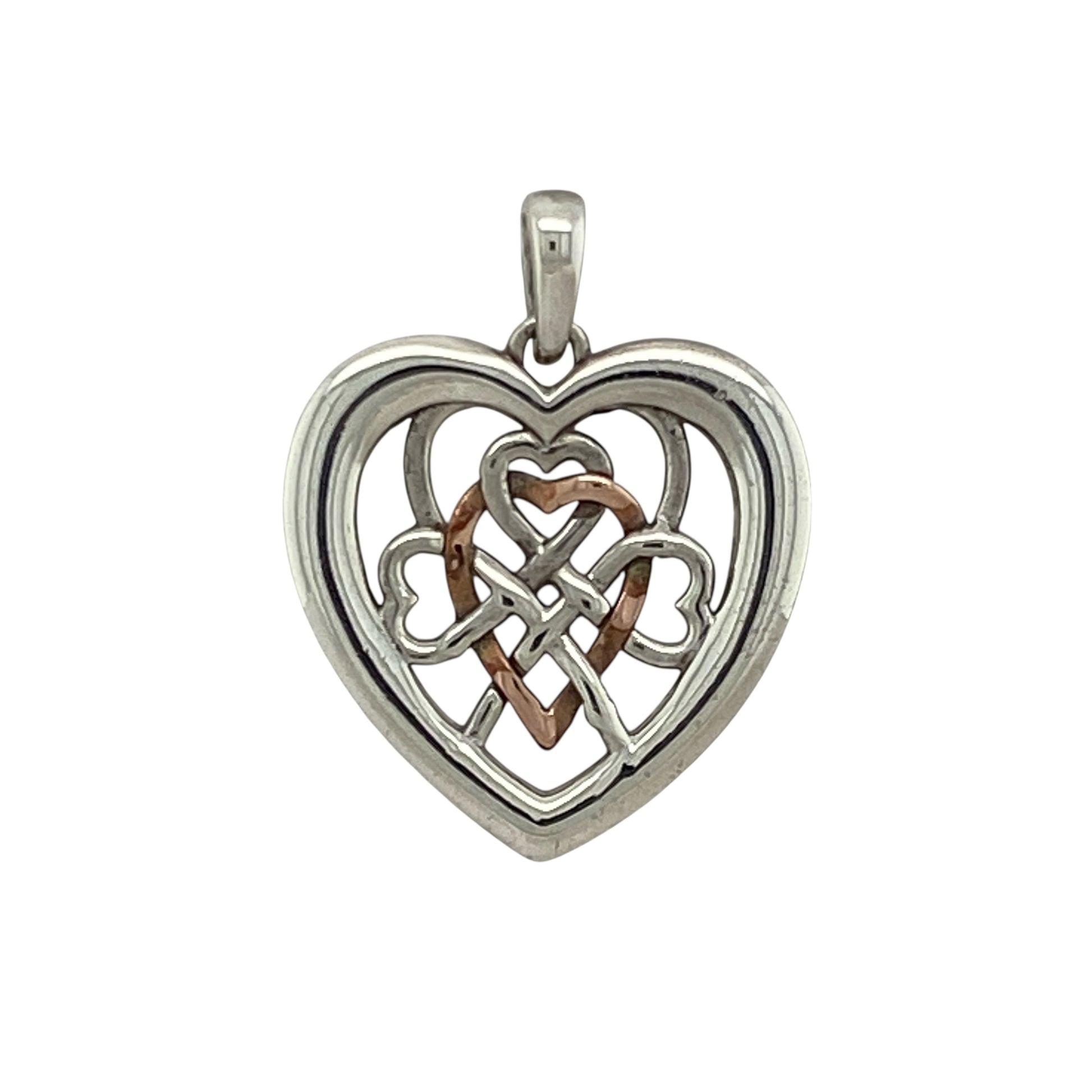 Bring romantic elegance and heritage style to your collection with this pre-owned Clogau Royalty heart pendant in sterling silver and rose gold, inspired by timeless design with a meaningful finish—perfect as a keepsake or thoughtful gift.

Design: The pendant features an elegant open heart design from Clogau’s Royalty collection, symbolising love and devotion with refined detail.
