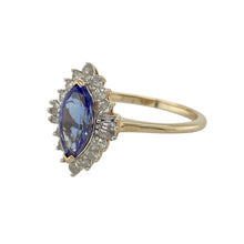 Load image into Gallery viewer, Bring vibrant colour and refined sparkle to your collection with this pre-owned 9ct yellow gold tanzanite and diamond cluster ring, offering elegant design and timeless beauty—perfect for special occasions or sophisticated everyday wear.

Design: The ring features a striking 9mm by 5mm marquise-cut tanzanite at the centre, surrounded by a cluster of baguette and brilliant-cut diamonds for a bright and eye-catching finish.

