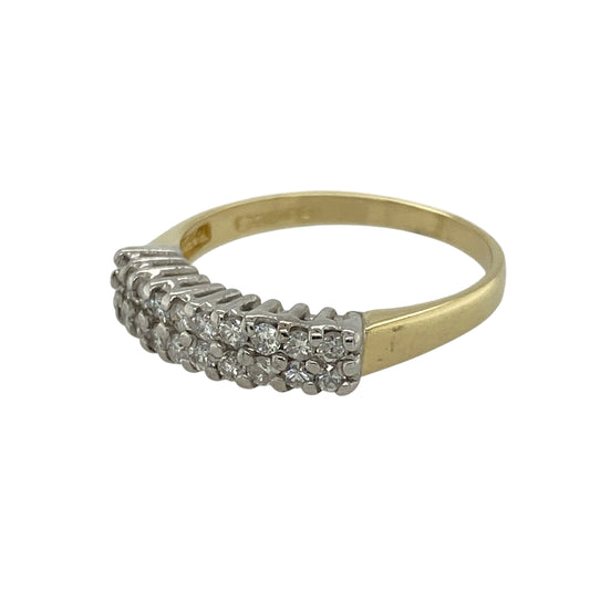 Bring refined sparkle and timeless luxury to your collection with this pre-owned 18ct yellow gold and platinum diamond band ring, offering elegant detail in a versatile design—perfect for both everyday wear and special occasions.

Design: The front of the band measures 4mm wide and is set with two rows of diamonds, creating a balanced display of brilliance across the surface.
