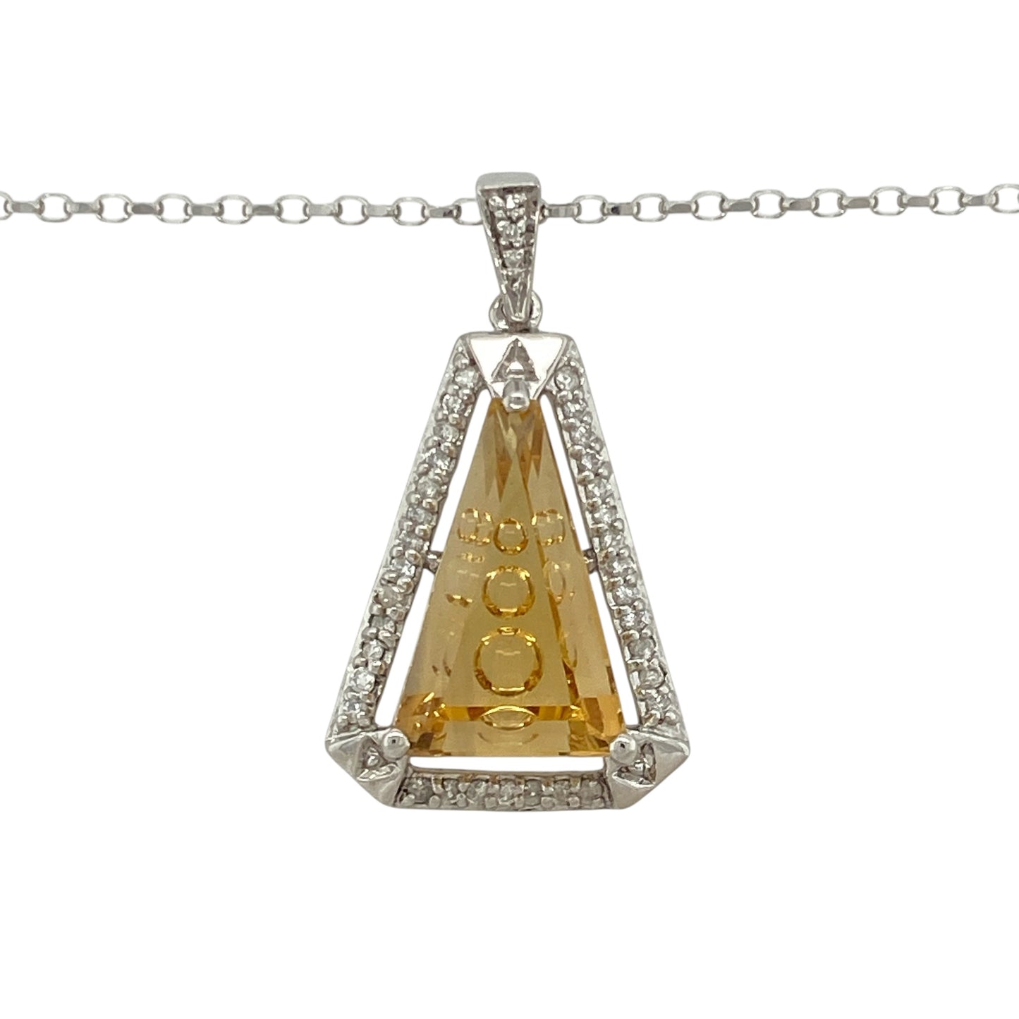 Bring warm colour and refined sparkle to your collection with this pre-owned 9ct white gold citrine and diamond pendant on an 18" belcher chain, offering timeless elegance with a vibrant twist—perfect for special occasions or statement everyday wear.

Design: The pendant measures 3.5cm long including the bail and features a striking triangular citrine, accented with sparkling diamonds for added brilliance.
