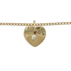 Bring romantic charm and timeless elegance to your collection with this pre-owned 9ct yellow gold heart pendant set with diamond and pearl on a 20" curb chain, offering symbolic beauty with a refined finish—perfect as a meaningful gift or everyday keepsake.

Design: The pendant measures 1.6cm long including the bail and features a delicate heart motif adorned with a single pearl and accented by sparkling diamonds.
