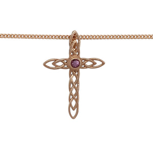 Bring heritage symbolism and elegant colour to your collection with this pre-owned Clogau Celtic cross pendant in 9ct rose gold, set with pink sapphire on an 18" Clogau curb chain—perfect as a meaningful keepsake or statement accessory.

Design: The pendant measures 3cm long and features a traditional Celtic cross detailed with intricate patterns and set with a 3mm round pink sapphire at the centre.
