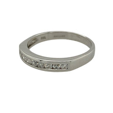 Load image into Gallery viewer, Elevate your collection with this pre-owned 18ct white gold diamond band ring, combining timeless design with refined sparkle—perfect for everyday elegance or celebrating a special milestone.

Design: The ring features a band of sparkling diamonds across the front, offering brilliance and sophistication in a classic style.
Material: Made from 18-carat white gold, the polished finish enhances the natural fire of the diamonds and adds to the ring’s luxurious appeal.

