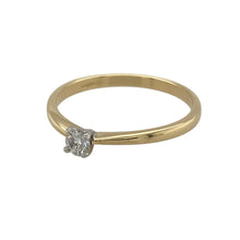 Load image into Gallery viewer, Add a touch of classic elegance to your collection with this pre-owned 18ct yellow gold diamond solitaire ring, offering timeless sparkle in a refined design—perfect for everyday wear or special occasions.

Design: The ring features a single brilliant cut diamond of approximately 0.14ct, creating a delicate yet sophisticated solitaire style.
Material: Made from 18-carat yellow gold, the polished finish provides a warm and luxurious backdrop that enhances the diamond’s natural beauty.

