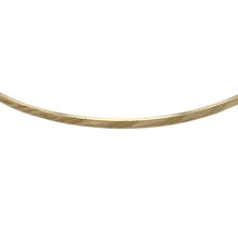Load image into Gallery viewer, Bring subtle elegance to your collection with this pre-owned 9ct yellow solid gold patterned bangle, a lightweight yet timeless accessory—perfect for everyday wear or stacking with other bangles.

Design: The bangle features a fine patterned finish, adding delicate texture and detail to a classic style.
Material: Made from solid 9-carat yellow gold, the polished surface enhances the warm tone and ensures lasting shine.


